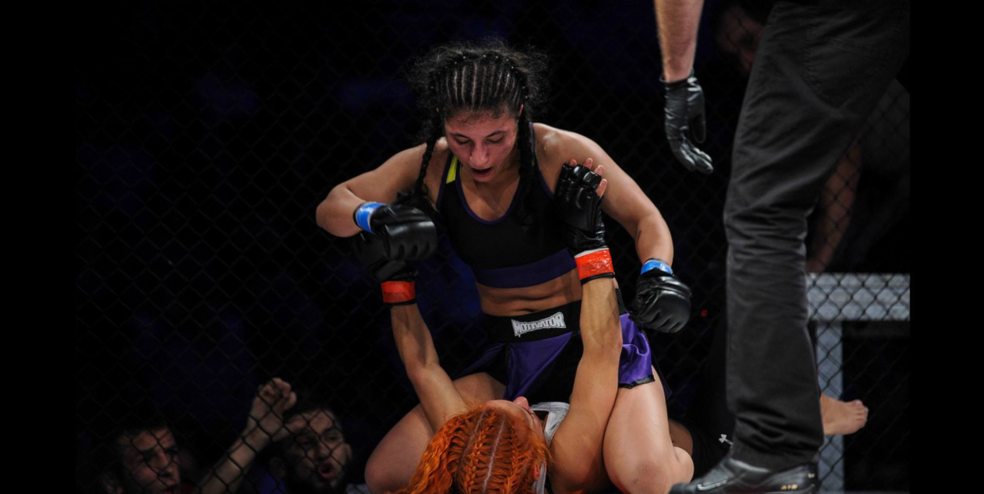 Iman Darabi in her professional debut. Photo by Piotr Pedziszweski for MMA Rocks.