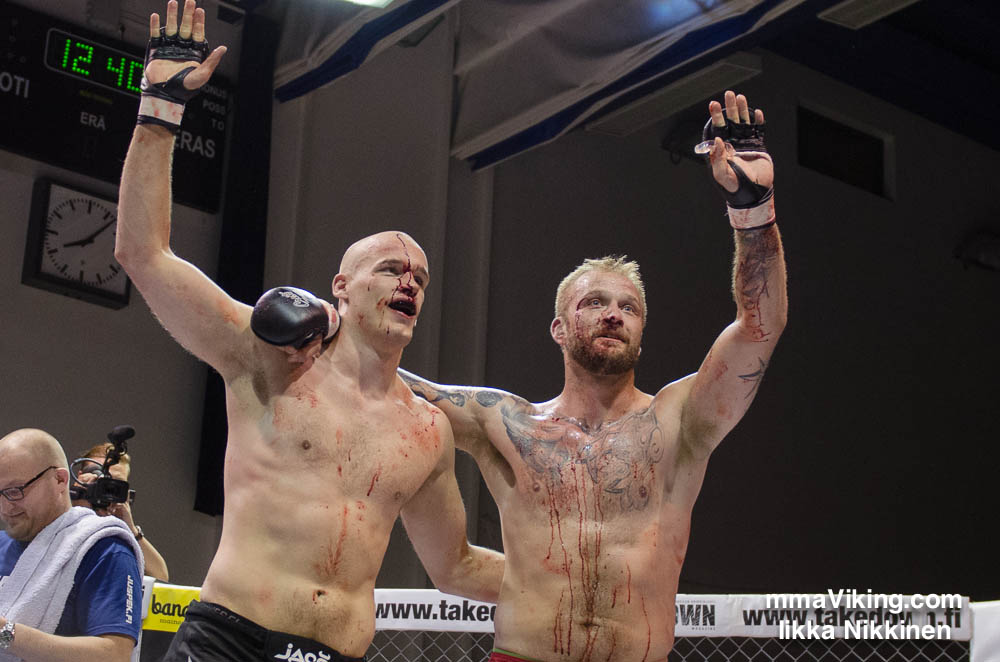 Antti Kästämä and Saku Heikkola bloodied up and in good spirit.