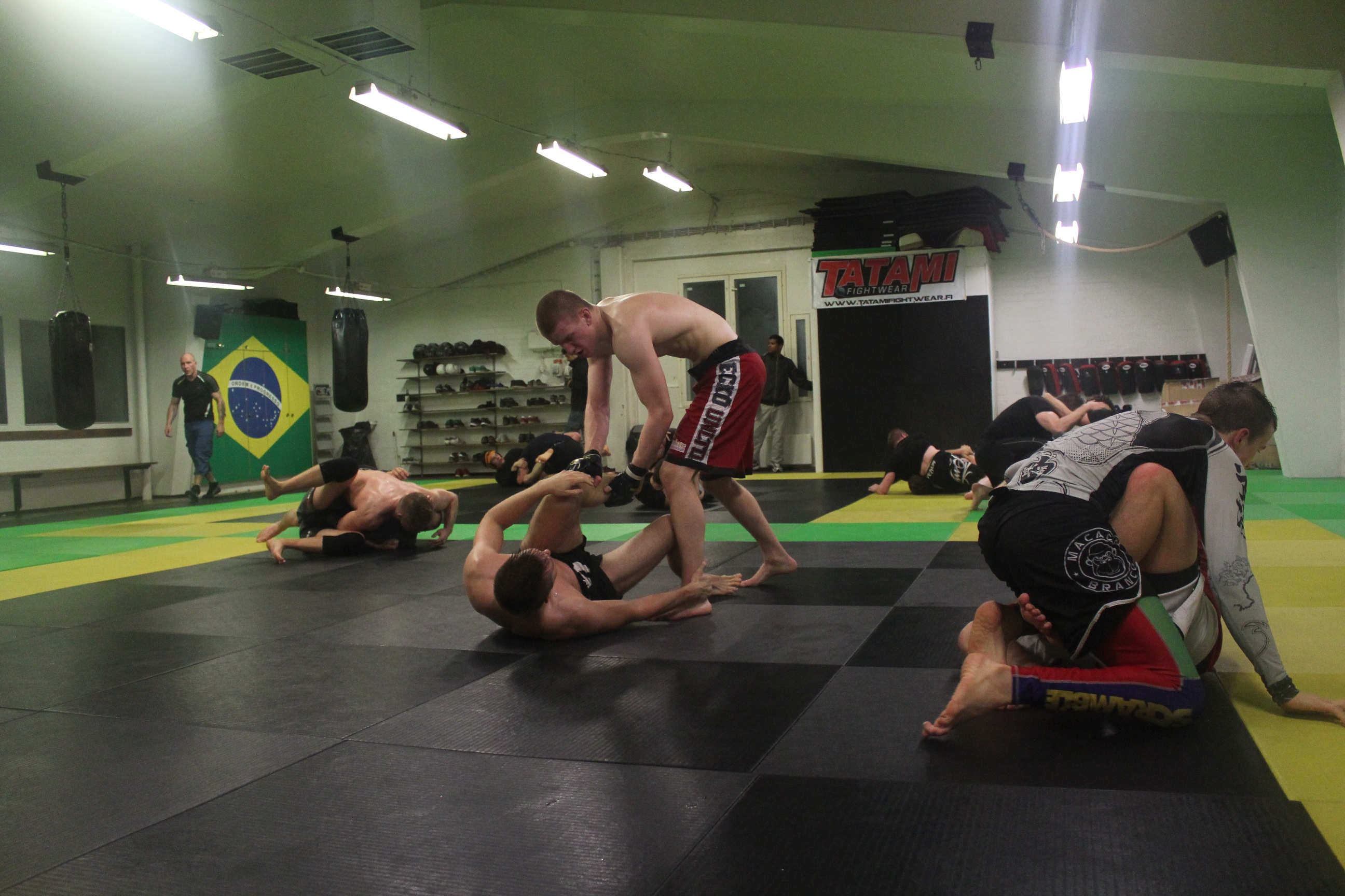 Ahmala (standing) trains at Oulu Combat Club in Northern Finland