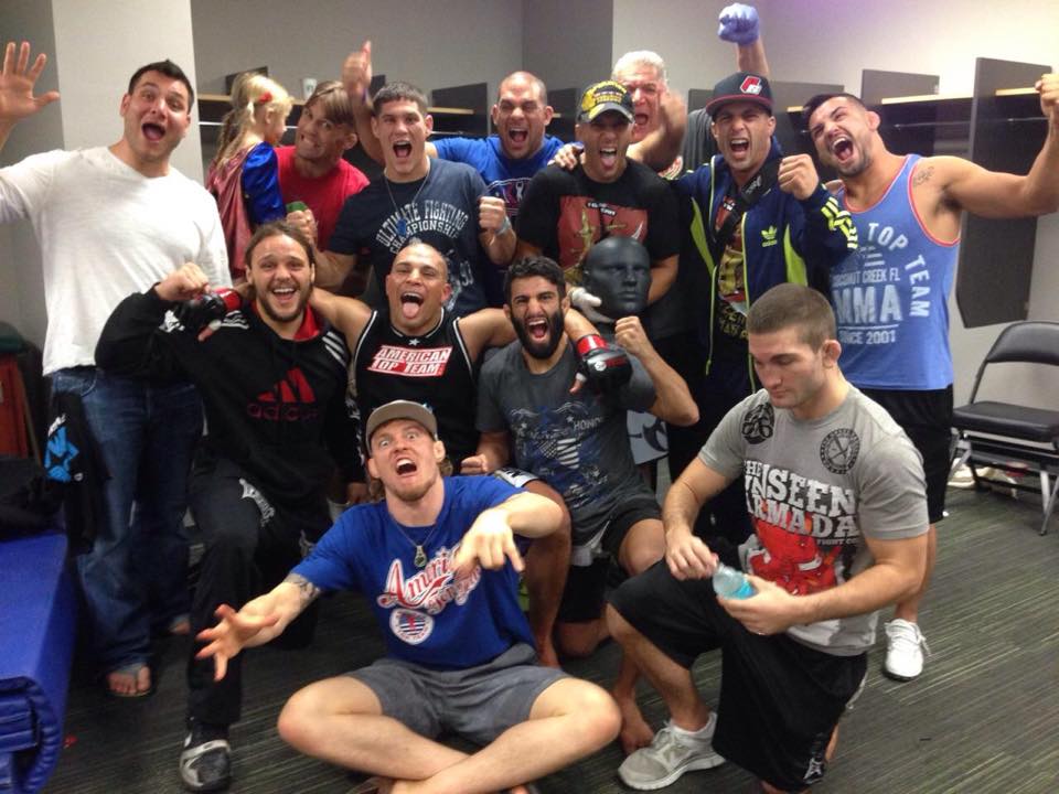 Kakai Celebrating with American Top Team After Bout