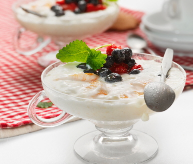 The rice pudding dish, typically served with berries or oranges  and/or cinnamon and butter
